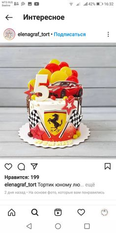 a red and yellow cake with cars on it