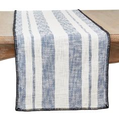 a blue and white striped table runner