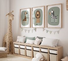 a child's room decorated in neutrals and pastel colors with animal prints on the wall