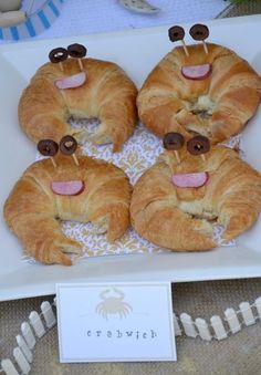 there are many croissants with funny faces on them