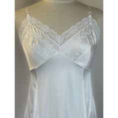 Women’s white, nylon slip. Very Good condition, size M (6 - 8). Detailed measurements:Bust - 32 inchesWaist - 34 inchesBody Length - 36 inchesHip - 42 inches Satin Slip, Sweetheart Neckline, Vintage 70s, Lace Trim, Camisole Top, Slip On, Satin, Trim, Tank Tops