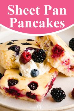 a white plate topped with blueberries and raspberry sheet pan pancakes