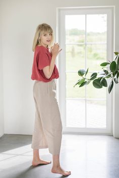 "Comfortable and lightweight linen pants REIMS fit perfectly to each figure and body type. DETAILS: <> Made from OEKO-TEX® certified 100 % European linen; <> Color in the picture: Beige; <> Linen pants REIMS with elastic waistband; <> Pants with two pockets; <> Model is wearing S size; Pants length: Outseam ± 88 cm / 34.7\", Inseam ± 62 cm / 24.4\"; <> Model height 183 cm / 6′; <> Product is made with family love. The quality of linen fabrics and product Relaxed Fit Flax Colored Bottoms, Relaxed Fit Linen Trousers, Relaxed Linen Trousers, Linen Tapered Leg Pants For Loungewear, Relaxed Flax-colored Straight Pants, Relaxed Flax Colored Straight Pants, Relaxed Straight Flax Pants, Linen Pants For Loungewear, Relaxed Fit Flax Pants For Loungewear