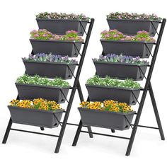 four tiered planter stands with flowers in them