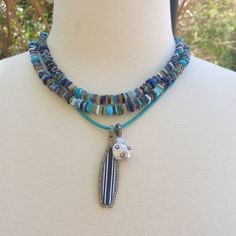 "All the colors of the ocean are combined in this long beaded necklace. Turquoise, lapis, larimar, blue agate and more! Wear this necklace single or double. Beautiful by itself or layer it with your other favorite pieces to create your own color story. Necklace: 37\" plus extender Layer this necklace with: https://www.etsy.com/listing/548308190/turquoise-and-diamonds-pendant-turquoise?ref=shop_home_active_159&frs=1&crt=1 or: https://www.etsy.com/listing/818339679/turquoise-necklace-handk Turquoise Single Strand Beaded Bohemian Necklace, Turquoise Single Strand Beaded Necklace In Bohemian Style, Blue Double Strand Bohemian Turquoise Necklace, Bohemian Double Strand Turquoise Necklace, Bohemian Blue Double Strand Turquoise Necklace, Blue Bohemian Double Strand Necklaces, Bohemian Blue Double Strand Necklaces, Bohemian Double Strand Blue Necklace, Bohemian Multi-strand Turquoise Necklace For Beach