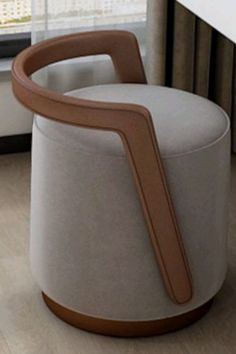 an unusual looking chair in front of a window