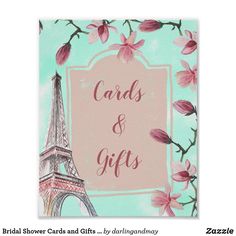 the eiffel tower with pink flowers on it is in front of a blue background