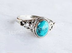 About Item Item :- Ring Gemstone :-Turquoise Stone shape:- Oval Stone size:- 5X7 mm approx. Ring size :- Choose from variation( Custom size accepted) Material :- 925 sterling silver Item Title :-Sterling silver ring, Natural turquoise ring, rings, knuckle ring, women's ring, stacking ring, blue turquoise ring, silver dainty ring Description:- We use 925 sterling silver & 14K pure gold to making jewelry. We accept all types of custom & personalized order. Please send us a message if you a Knuckle Ring, Turquoise Ring Silver, Rainbow Moonstone Ring, Knuckle Rings, Ring Stacking, Labradorite Ring, Ring Blue, Oval Stone, Ring Gemstone