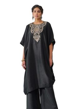 Black kaftan kurta with contrasting hand embroidered yoke with TT brooch. Comes with wide legged pant. - Aza Fashions Black Designer Kaftan, Designer Black Kaftan For Eid, Designer Wear Kaftan With Embroidered Border, Traditional Kaftan With Embroidered Neckline, Ceremonial Dabka Kaftan, Black Kaftan With Resham Embroidery Traditional Drape, Elegant Black Kaftan With Chikankari Embroidery, Designer Black Kaftan With Resham Embroidery, Traditional Black Kaftan With Floral Embroidery