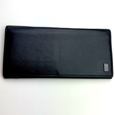 Dunhill Black Leather Long Bifold Wallet Minimalist Style Card Holder Authentic Soft Luxury Leather, Light, Almost Flat /If Without Cards And Inserts. Large Wallet With Multiple 10 Card Slots,3 Bill Slots That Can Fit A Checking Book As Well, A Long Coin Pouch. Logo Outside And Inside. Flat Measurements Approximately: Length 19 Cm / 7.5 Inches Height 10 Cm / 3.9 Inches The Over All Is Very Good Condition, O Noticeable Damage, Gently Used. Please Check The Photos For More Details. *The Exterior Is Rubbed With Micro Rubs And Scratches. No Major Flaws Noted ~ Very Gently Used. No Original Packages Left. Do Not Hesitate To Ask Any Questions Or Negotiate The Terms. Use Bund Modern Black Wallets For Business, Modern Black Business Wallets, Leather Wallets With Rfid Blocking, Leather Wallets With Rfid Blocking For Office, Classic Black Soft Leather Wallets, Elegant Business Wallets With Leather Lining, Black Soft Leather Formal Wallets, Formal Black Soft Leather Wallets, Classic Black Wallet