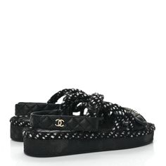 This is an authentic pair of CHANEL Cord Lambskin Quilted Logo Sandals Size 36 in Black and White. These casual yet chic sandals feature quilted lambskin and woven rope straps, a gold Chanel CC logo, and cork midsoles. Chic Sandals, Gold Chanel, Cc Logo, Chanel Shoes, Cork, Dust Bag, Chanel, Black White, Sandals