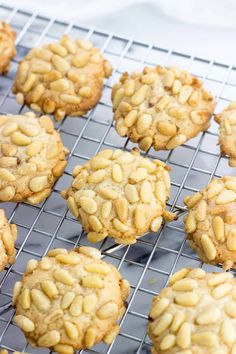 several cookies are cooling on a wire rack