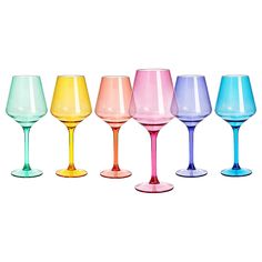 six different colored wine glasses lined up in a row