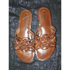 Step into summer with these BASS Artisan Brown Leather Sandals in size 6. Perfect for women who value comfort, quality and style.  used but cared for All used bags/shoes may have the following ✔️Discoloration ✔️Signs of use ✔️Scratches scuffing ✔️rubs ✔️Pls check the pictures closely as they are part of the description. ✔️All sales are final. No exchange. No refund ✔️All used footwear is thoroughly cleaned and sanitized Size: Womens 6 Condition: Pre-Owned Good Beach Embellished Leather Sandals, Brown Leather Embellished Sandals, Brown Embellished Leather Sandals, Brown Embellished Sandals For Vacation, Brown Embellished Summer Sandals, Casual Embellished Open Toe Sandals, Casual Brown Embellished Sandals, Brown Leather Sandals, Embellished Sandals