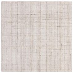 an area rug with white and beige colors