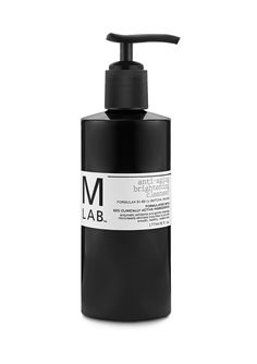 a bottle of liquid that is black and white with the word lab written on it