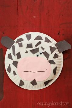 a paper plate with a cow on it