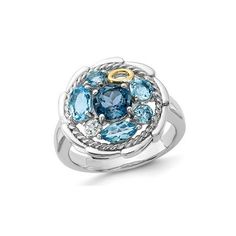 A stunning round london blue topaz gem (1.05 carats (ctw) sits at the center of this beautiful gemstone ring surrounded by round and oval swiss blue topaz gems 1.36 carats (ctw) , with a white topaz completing the look. This unique and colorful ring brings simplicity and elegance to life featuring the birthstone of the month of December. 2.49 Carat (ctw) London Blue Topaz Ring in Sterling Silver Size: 7.  Gender: female.  Age Group: adult. Cathedral Engagement Rings, Paris Jewelry, Blue Topaz Jewelry, Sapphire Earrings Studs, White Topaz Rings, Sapphire Studs, London Blue Topaz Ring, Blue Topaz Stone, Swiss Blue Topaz