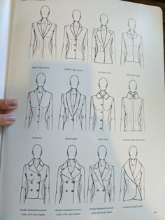 an open book with drawings of men's suits