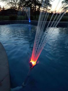 PRICES MAY VARY. Pool Jet Fountain Light: Shake up your pool time routine day or night with this stylish above ground and inground pool fountain, paired with multicolor LED pool lights Pool Light Fountain Ambiance: Provides calming water sounds, visual appeal, and a colorful pool light show for an ideal outdoor addition whether you want to chill out or party Easy Install: Pool light and fountain are powered by your pool jet with no batteries or electricity required; Installs in seconds with the Swimming Pool Fountains, Fountain Waterfall, Routine Day, Color Changing Light Bulb, Pool Water Features, Swimming Pool Accessories, Pool Lounger, Pool Fountain, Time Routine