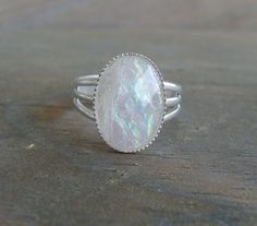 Stunning opalescent faux opal ring. Stone measures 18x13mm and is set in a sterling plated adjustable ring. Gold Bracelet For Women, Cute Rings, Opal Ring, Moon Stone, Opal Rings, Adjustable Rings, White Silver, Fire Opal, Stone Rings