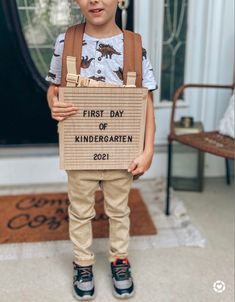 Boy holding back to school sign First Day Of Kindergarten Letter Board, First Day Letter Board, First Day Boards Back To School, Kindergarten Letter Board, First Day Of School Outfit Boy, First Day Of School Letter Board, First Day Of School Picture Ideas, School Letter Board, First Day Of Kindergarten Outfit