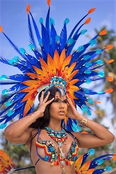 a woman in a blue and orange costume