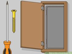 a screwdriver is next to an open cabinet