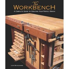 the workbench book is open to show woodworking tools