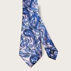 Treat yourself with a new pattern and splash of color to your look with this unique tie set. 100% Micro Fiber Handmade Package Includes: Tie Length: 59" Width: 3" Warm iron if needed Fitted Blue Silk Tie, Blue Paisley Print Tie For Black Tie Events, Blue Paisley Print Ties For Black Tie Events, Blue Paisley Print Ties For Black Tie Occasion, Blue Paisley Print Standard Tie, Blue Paisley Print Tie, Blue Silk Neckwear With Ties, Blue Neckwear For Formal Spring Occasions, Blue Neckwear For Formal Occasions In Spring