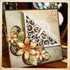 a close up of a card with flowers on it