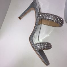 Nwot Life Of The Party- That’s You In These Silver Jeweled Stilettos. The Open Toe Double Strap Of Jewels Will Have You Looking And Feeling Comfortable. Size. 8 Color. Silver Open Toe Heel. 3.34” Condition. New Like Condition, More Money Fitted Heels For Night Out And Party Season, Glamorous Fitted High Heel Shoes, Glamorous Fitted High Heels, Fitted Silver Heels For Party Season, Glamorous Fitted Heels For Party, Fitted Open Toe Glitter Heels, Sparkling Fitted High Heels, Glitter Open Toe Heels, Glitter Heels Fitted For Night Out