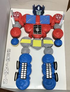 a birthday cake in the shape of a transformer