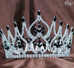 Black Rhinestones Tiaras Diadem Wedding Brides Crystal Crowns Pageant Party Prom     Description:   You are looking at a gorgeous tiara crown. Sparkling clear genuine austrian rhinestones and simulated red ruby are set in a silver-plated setting. All rhinestones sparkle a lot and are prong set by hands! with unadjustable full band. 4 small loops at the bottom, can use hair clips to fix the crown. This headpiece is full of sparkle! It is perfect for wedding, pageant, prom, party, c Sweet 16 Crowns, Quince Crown, Diadem Wedding, Crystal Crowns, Wedding Brides, Black Crown, Rhinestone Tiara, Tiara Crown