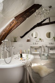 an instagram photo of a bathroom with white fixtures