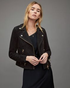 Women's Suede Leather Biker Jacket In Black Outer Shell: Real Leather Leather Type: Goatskin Leather Finish: Suede Inner Shell: Viscose Lining Feature: Gold-Tone Hardware Closure Style: Zipper Collar Style: Notch With SnapButton Cuffs Style: Zipper Inside Pockets: One Outside Pockets: Two Side Zip Pockets Color: Black Black Suede Jacket, Leather Shorts Women, Short Leather Skirts, Suede Biker, Leather Jumpsuit, Studded Jacket, Sheepskin Jacket, Jacket Outfit, Stylish Jackets