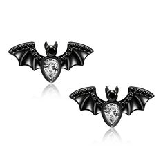 PRICES MAY VARY. 【BAT THEME JEWELRY】Ideal bat earrings gift for women who love bats, animals, witches, ghosts, vampires, dark and evil etc. 【GOTHIC DESIGN】 The Halloween bat earrings are designed with punk, Gothic style, with flying wings, ideal jewelry for daily outfits as well as your Halloween party. 【MYSTERIOUS THE "GUARDIAN OF THE NIGHT"】 Bats sleep in the caves and rise out in the night. It symbolizes intuition, rebirth, communication, journey, travel, happiness, and prosperity. Bat earrin Handmade Sterling Silver Halloween Earrings, Sterling Silver Halloween Pendant Jewelry, Black Bat Jewelry, Gothic Nickel-free Halloween Earrings, Victorian Bat Jewelry, Vampire Earrings, Bat Jewelry, Bat Earrings, Gothic Design