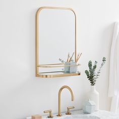 a bathroom sink with a mirror above it