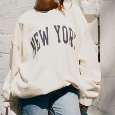 Soft Oversized Sweatshirt In Ivory With The Navy Blue New York Printed On The Chest. Fabrics: 70% Cotton, 30% Polyester Measurement: 29" (74 Cm) Length, 28" (71 Cm) Bust Made In: China Nwot Cut Off Sweatshirt, New York Sweatshirt, Random Clothes, Color Sweatshirt, Comfy Sweatpants, Half Zip Sweatshirt, Cozy Pullover, Comfy Sweatshirt, John Galt