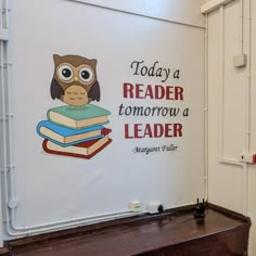 there is a sign that says today a reader tomorrow a leader with an owl on it