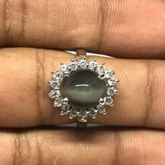 Welcome to Elegant Art Jewelry!  Material: 925 Sterling Silver Stone: Cats Eye Side Stone: Zircoin Stone Cut: Oval Cabution Personalization: 9K/14K/24K/GOLD/SILVER/PLATINUM/ROSE-GOLD/WHITE GOLD. (Contact me)  Cats Eye Ring, Cats Eye Cuff Ring, 14k White Gold Ring, Oval Shape Ring, Cats Eye Ring, Cats Eye Engagement, Open Design Ring, Cats Eye Oval, Cats Eye Natural, Gray Cats Eye, Gray Gemstone, Gemstone Ring, Engagement Ring, Wedding Ring, Statement Ring, Cats Eye Ring, Victorian Ring, Cats Eye Cats Eye Engagement Ring, Eye Engagement Ring, Wedding Ring Luxury, Stone Ring Design, Gray Cats, Cats Eye Ring, Eye Natural, Gray Gemstones, Ring Luxury