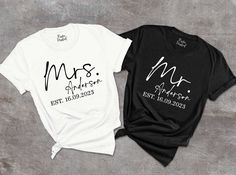 two t - shirts that say mr and mrs on the front, one is black and white