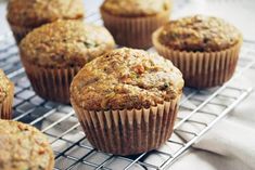 several muffins cooling on a wire rack