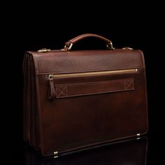 With unparalleled functionality in mind, we designed our No.1 Briefcase to be the perfect accompaniment to a style-conscious contemporary professional's everyday life. Inspired by the classics, the No.1 Briefcase is all about luxury and style that effortlessly finds its way into the modern day. Both smooth and sleek, this briefcase is expertly constructed in Northern Italy using only the finest premium Italian leather— certified full-grain vegetable-tanned cow leather. Fully lined with fine cott Classic Rectangular Cases For Business Trips, Timeless Formal Rectangular Case, Classic Cases For Everyday Use, Classic Rectangular Cases For Formal Use, Classic Rectangular Cases For Formal Occasions, Luxury Rectangular Cases For Work, Classic Rectangular Briefcase, Classic Rectangular Office Cases, Classic Case With Leather Lining For Business