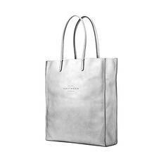 Kingly North South Tote in silver lambskin | Smythson Everyday Saffiano Leather Shoulder Bag With Dust Bag, Travel Bag With Saffiano Leather And Leather Handles, Rectangular Saffiano Leather Travel Bag, Luxury Large Capacity Everyday Bag, Classic Saffiano Leather Bags For On-the-go, Classic Bags With Luggage Sleeve, Saffiano Leather Tote Bags For Shopping, Travel Bag With Top Carry Handle In Saffiano Leather, Luxury Large Capacity Shoulder Bag For Daily Use