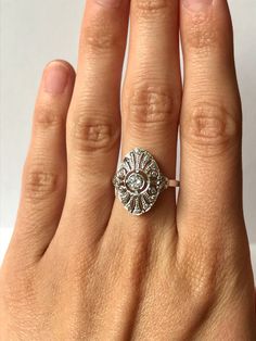 Once in a Blue Moon beautiful vintage finds. Cz Diamond Filigree Ring // Solid 925 Sterling Silver Size: 5, 6, 7, 8, 9, 10 US Setting Size: 19 x x 12 mm Center CZ: 0.25 ct (4 mm) Weight: 2.95 g (size 7) Band width: 1.5 mm Free Shipping, comes in ring box ready to gift! Heirloom Diamond White Jewelry, Antique Silver Cluster Ring With Center Stone, Vintage Silver Filigree Ring With Diamond Accents, Antique Jewelry In Diamond White With Brilliant Cut, Vintage Diamond Cut Jewelry For Anniversary, Heirloom Sterling Silver Diamond Ring, Antique White Gold Cubic Zirconia Jewelry, Antique Ring With Diamond Accents For Promise, Vintage Diamond White Jewelry With Diamond Accents