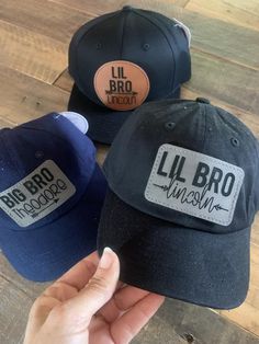 Big bro lil bro hats, leather hat patch kids hat.You can purchase the hat or just the patch. Toddler hat fits anywhere from 8 months - 5 years old. It does have a closure to make it tighter/looser.Youth hat fits anywhere from 5 years- 14 years. After that I would recommend a regular adult hat. I can do adult hats to match too.The patch is iron back and sticky so you can iron it right on! Big bro expiring construction Toddler custom shirt, youth custom shirt, adult custom shirts. I can use any co Leather Patch Cap Hat Gift, Leather Patch Cap As A Gift, Leather Patch Cap - Gift, Leather Patch Cap As Gift, Brown Baseball Cap As Gift, Personalized Brown Hat As A Gift, Adjustable Hats With Leather Patch As Gift, Leather Hat Patch, Toddler Easter Shirt