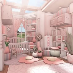 a baby's room decorated in pink and white