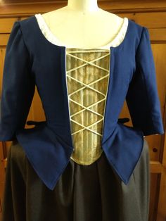 We only have one ready to ship, with a dark blue bodice and brown wool skirt. It includes the bodice, stomacher, skirt, and bum roll. We are unusually busy this year, so custom sizes require a THREE MONTH wait. Your costume will not be made until late October, and it will NOT ARRIVE IN TIME FOR HALLOWEEN Inspired by Claire Fraser's season 1-2 Outlander costumes. The ones seen here include a blue wool bodice worn with a brown wool skirt, but we can make them in any color or print at various price Outlander Costumes, Outlander Claire, 18th Century Dress, Century Dress, Claire Fraser, Wool Skirt, Wool Skirts, Women's Costumes, Blue Wool