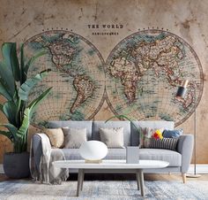 a living room with an old world map on the wall